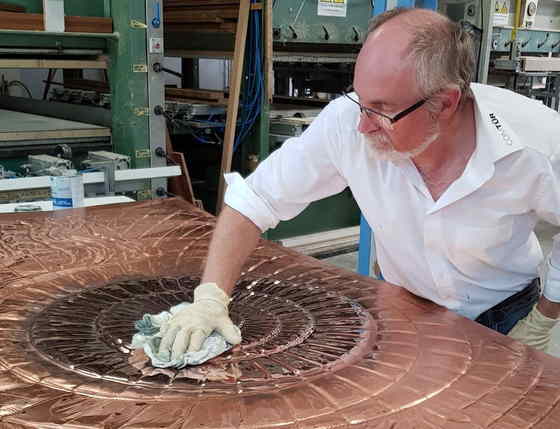 Copper door hand polishing